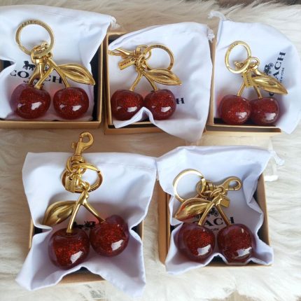 ميدالية كريز كوتش - Coach Cherry Bag Charm